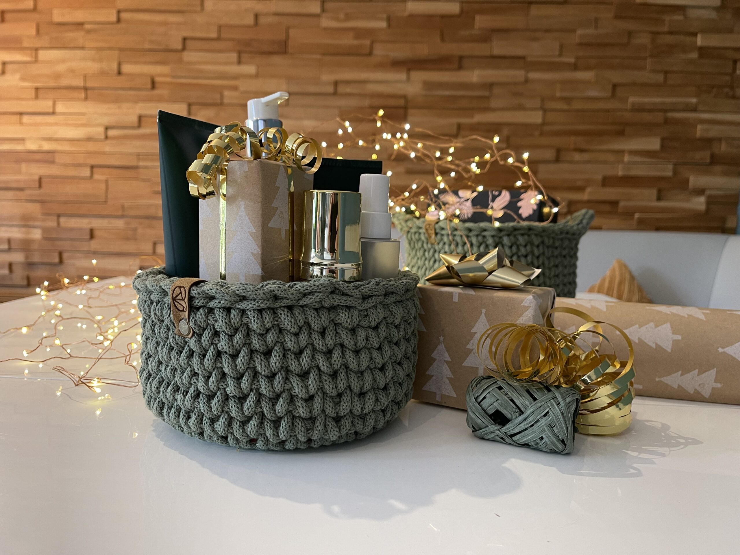 crochet basket containing christmas presents